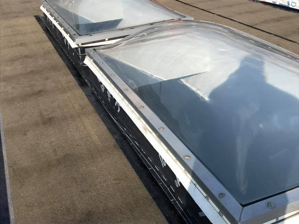Flat-roof-skylight_flashing-Statewide-Construction_and_Roofing